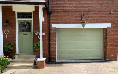 White Garage Door to Sample Green