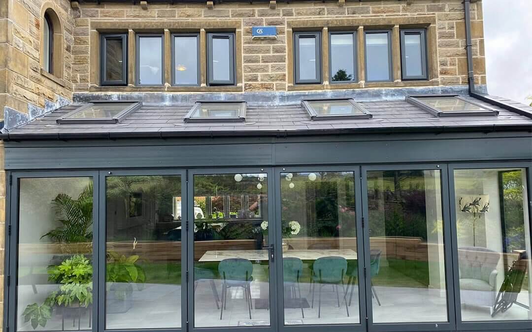 Brown Windows and White Trims sprayed Anthracite Grey to match Bifolding Doors
