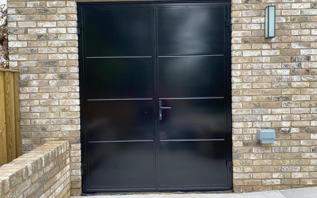 Large Double Doors sprayed on site from RAL 9004 (Matt Black) to RAL 9005